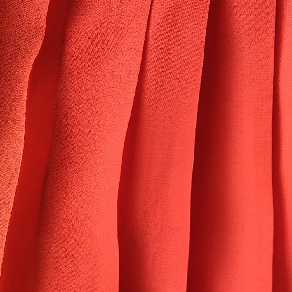 Sparkle and fade knife pleat orange skirt